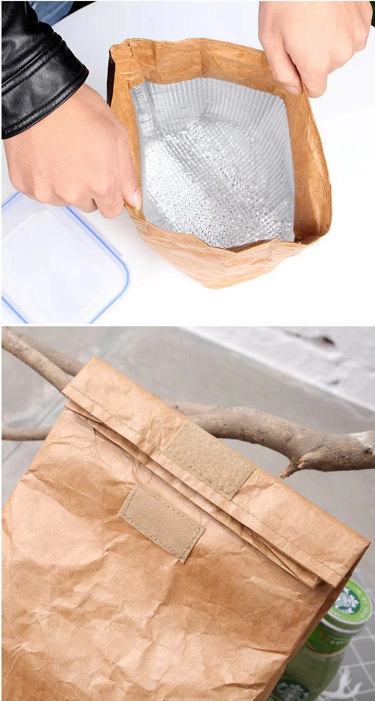 Kraft paper insulated lunch bag material with thermal lining and handled construction Kraft paper insulated lunch bag material with thermal lining and handled construction